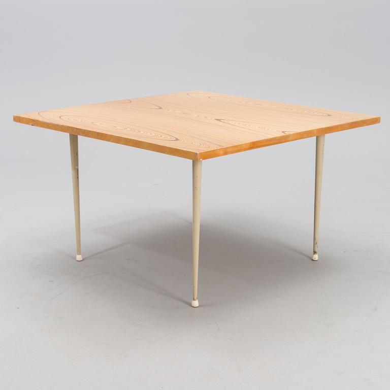 A coffee table marked Tapio Wirkkala, Asko, Made in Finland.