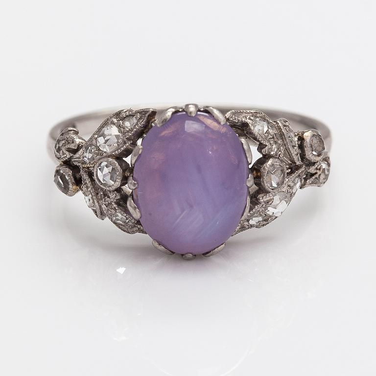 Oskar Pihl, A platinum ring with a ca. 4.0 ct star sapphire and rose-cut diamonds ca 0.12 ct in total. A Tillander 1930s.