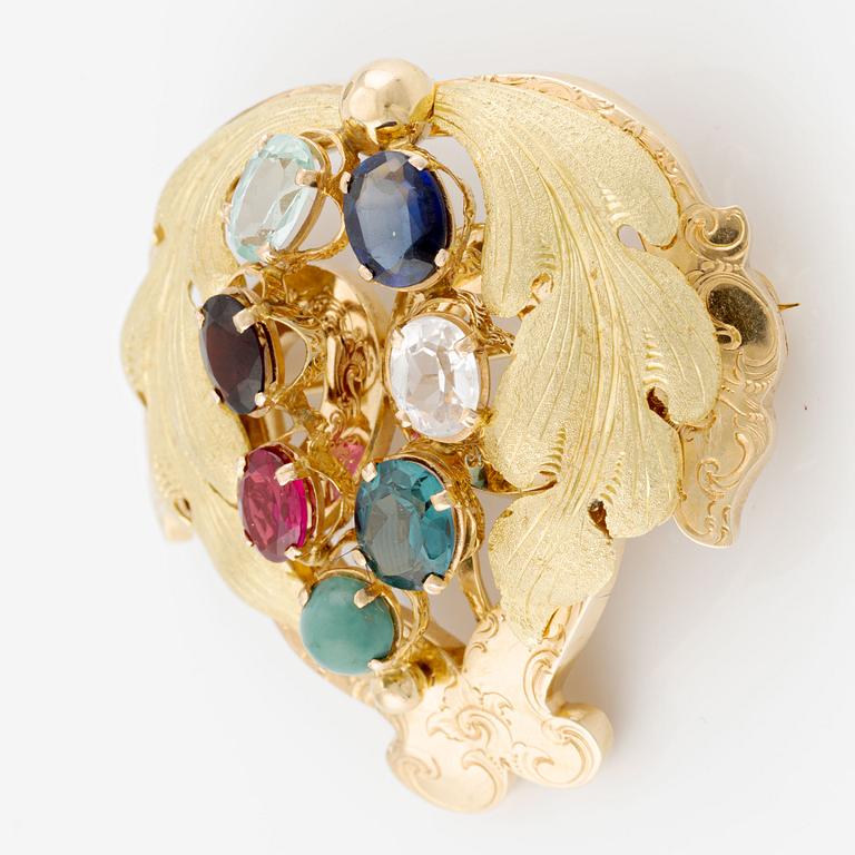 Brooch, 18K gold with coloured stones, 19th century.