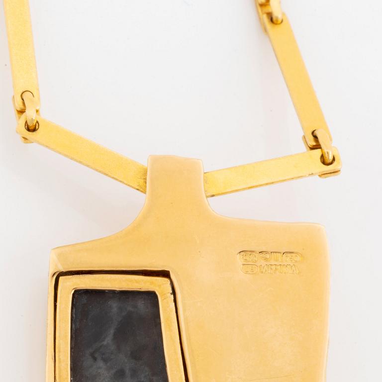 A Lapponia necklace design Björn Weckström in 18K gold set with spectrolite.