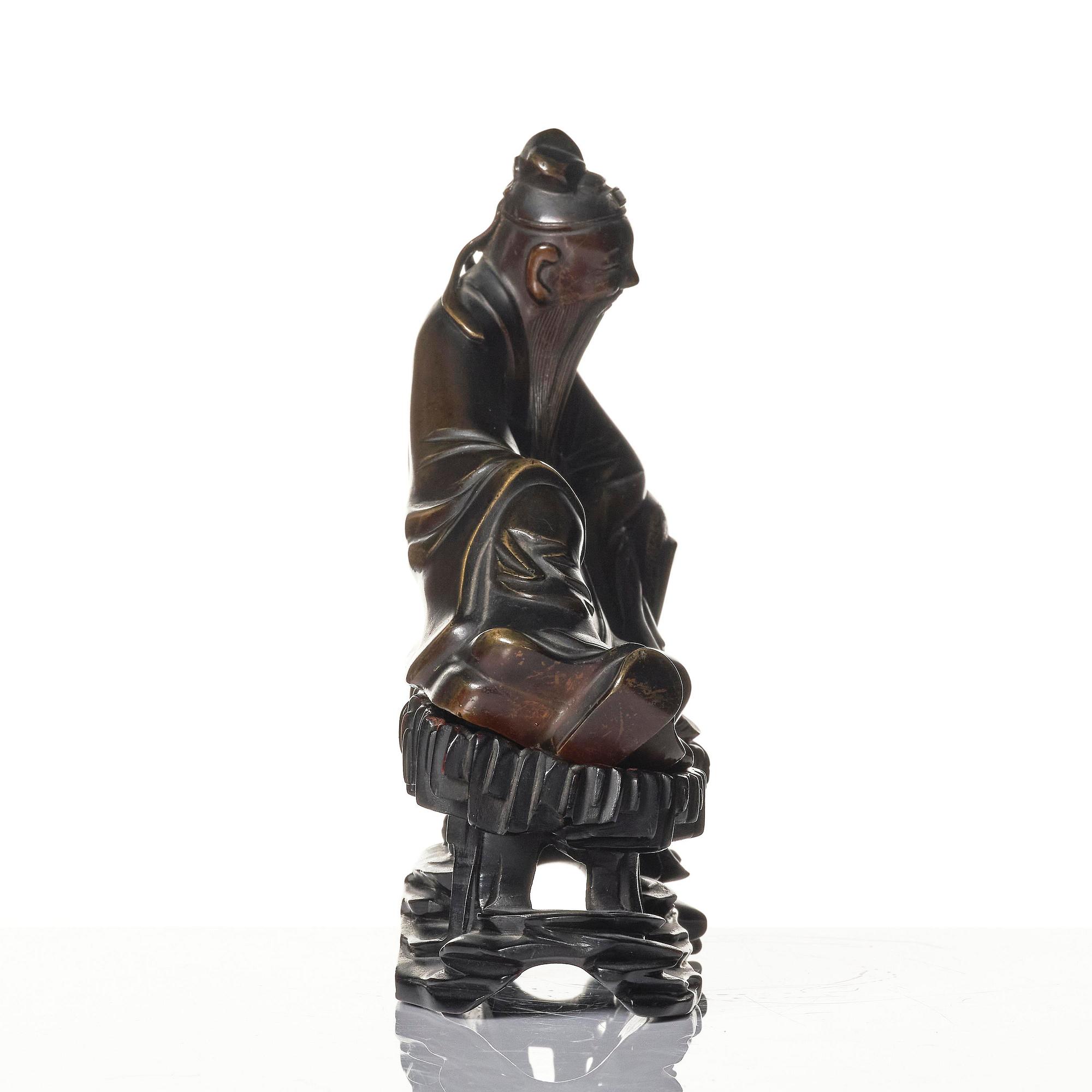 A bronze sculpture of the drunken poet Li Bai, Qing dynasty.