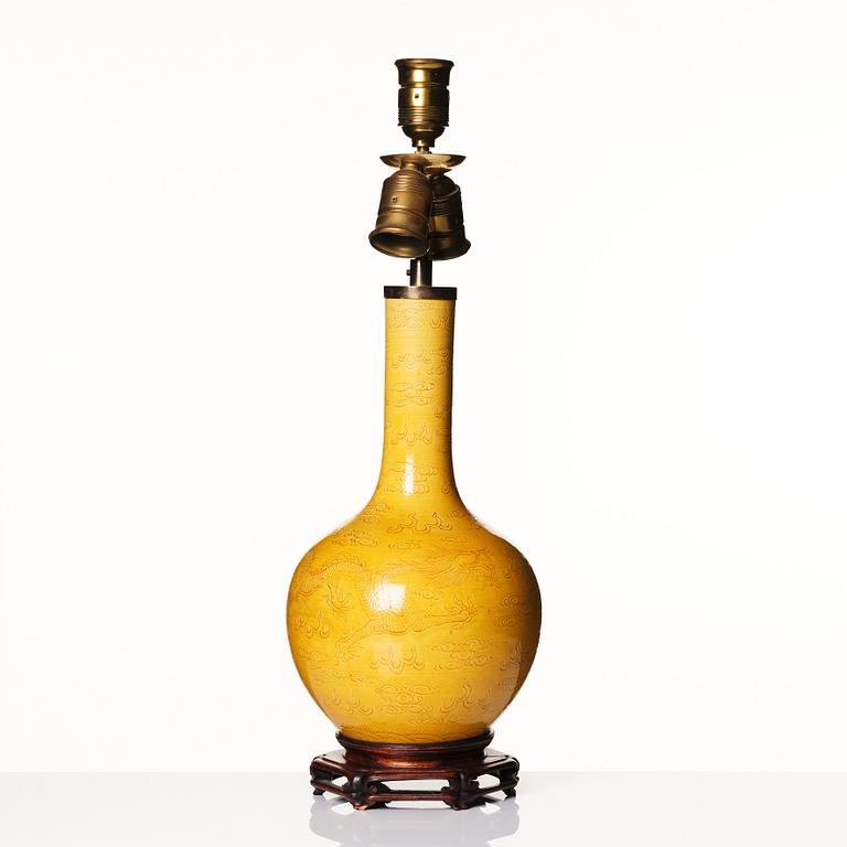 A yellow glazed 'five clawed dragon' vase, Qing dynasty with Kangxi six character mark.