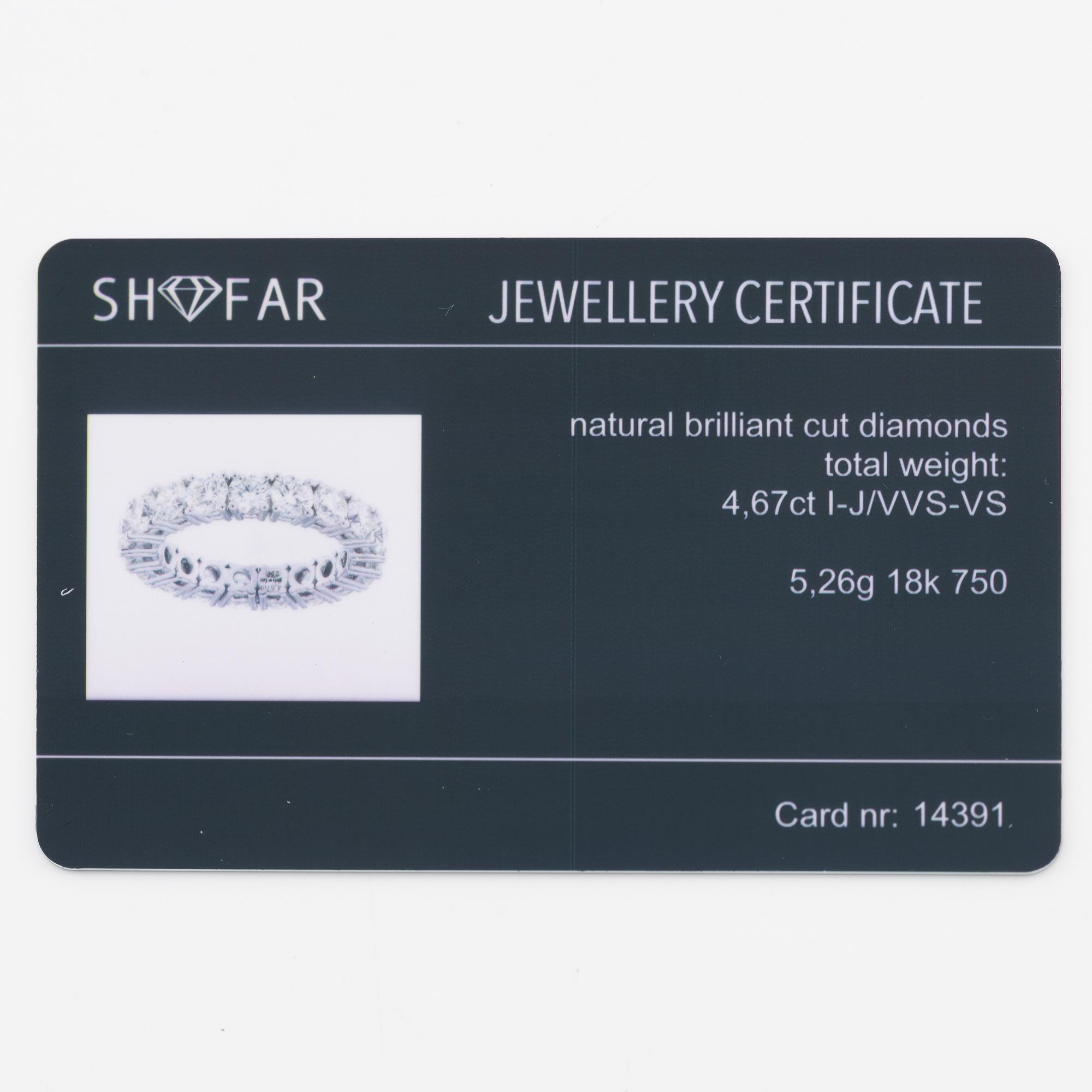 Ring helallians, 18K vitguld med briljantslipade diamanter.