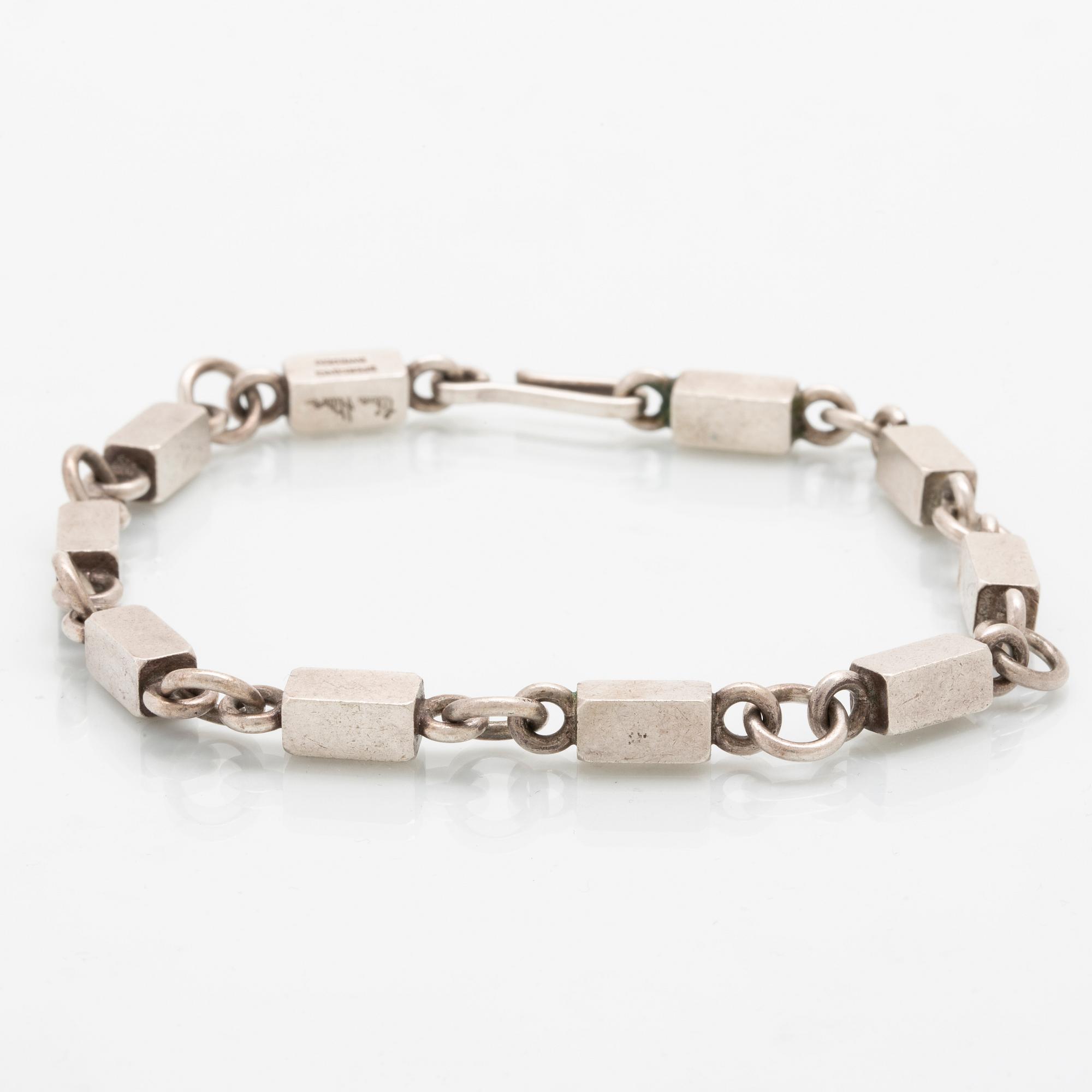 A Swedish sterling sivler bracelet mark of Wiwen Nilsson Lund 1962 length 24 cm, weight 347 grams,
