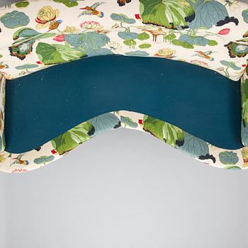 A model 968 sofa by Josef Frank for Firma Svenskt Tenn.