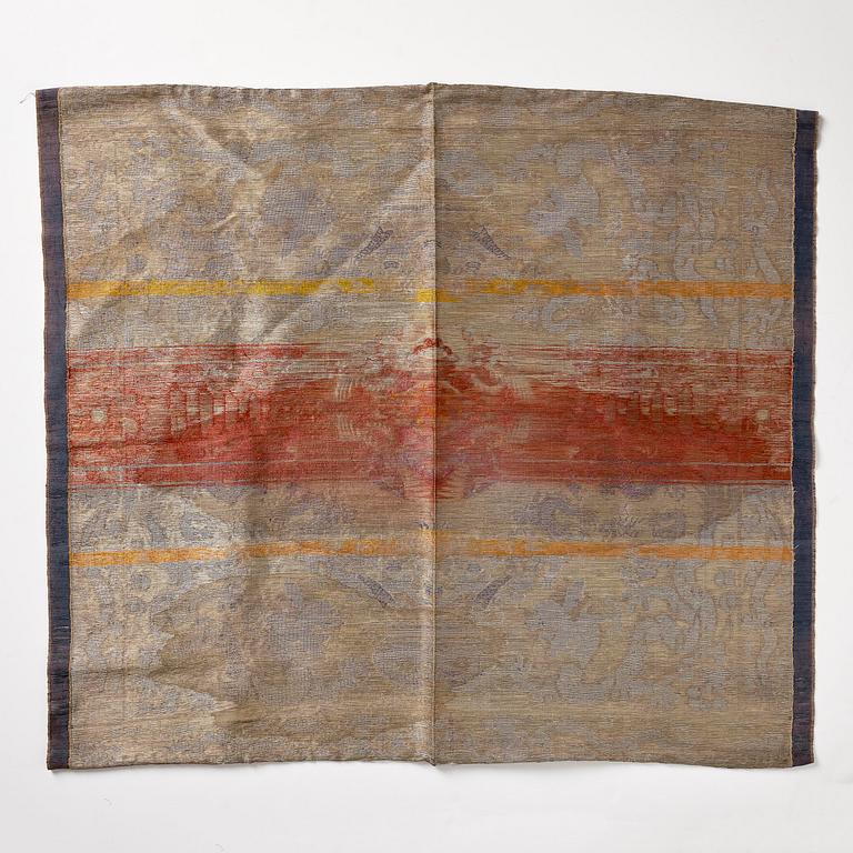 A silk blue-ground brocade panel, late Qing dynasty/early 20th century.