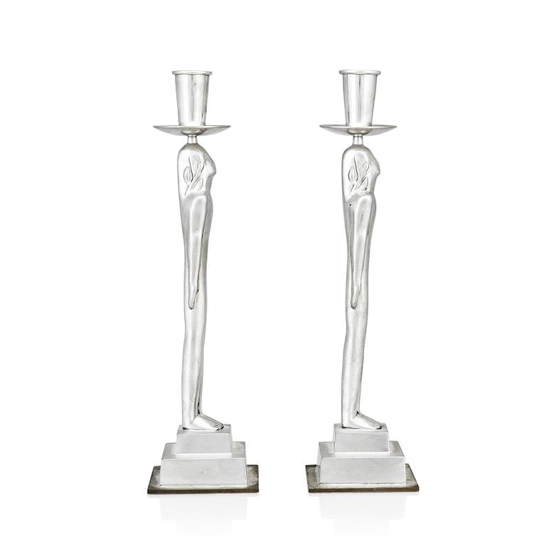 Edvin Öhrström, a pair of pewter and brass 'Egyptian' candlesticks, Svenskt Tenn, Sweden 1984.