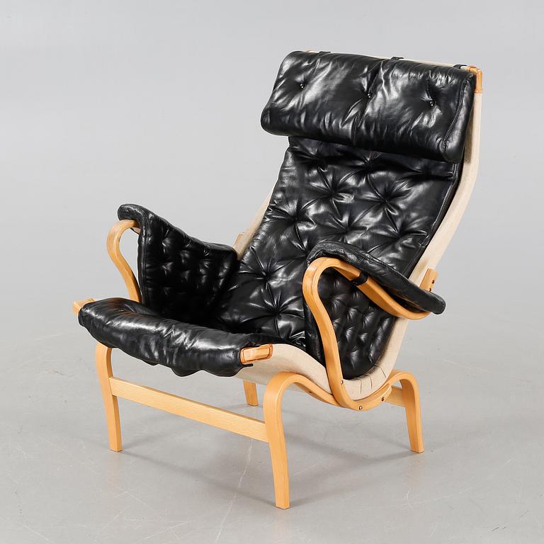 A 20th century "Pernilla" armchair, designed by Bruno Mathsson for DUX.