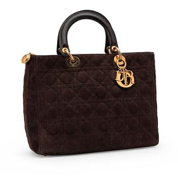 735. CHRISTIAN DIOR, a brown suede handbag.