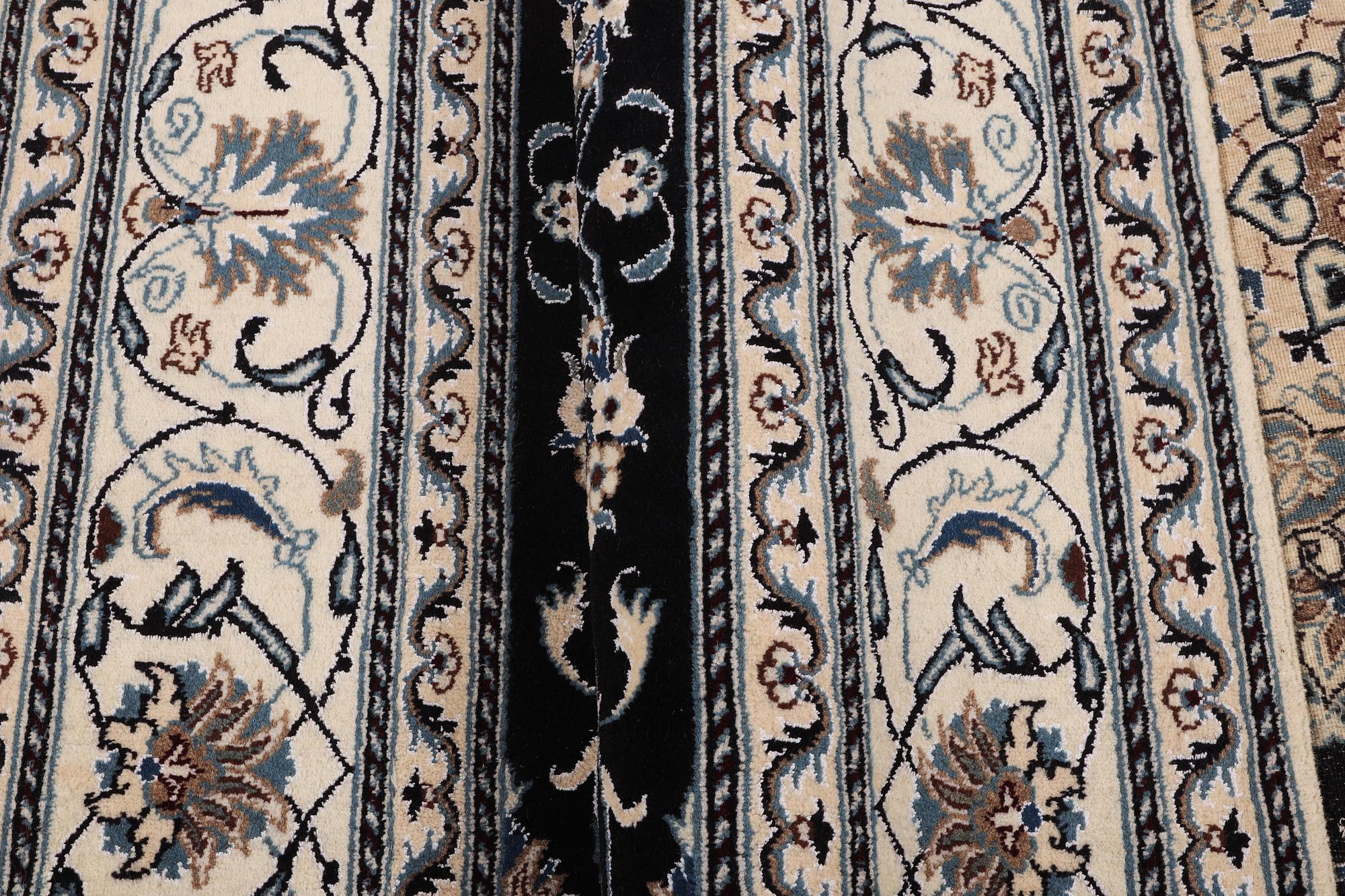 A carpet, Nain, part silk, ca 307 x 198 cm.