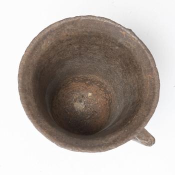 A Gothic-type cast-iron mortar and pestle, 17th / 18th century.
