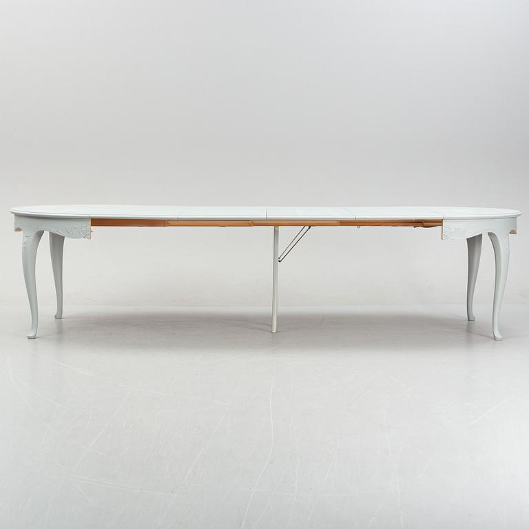 A Rococo style dining table, second half of the 20th Century.