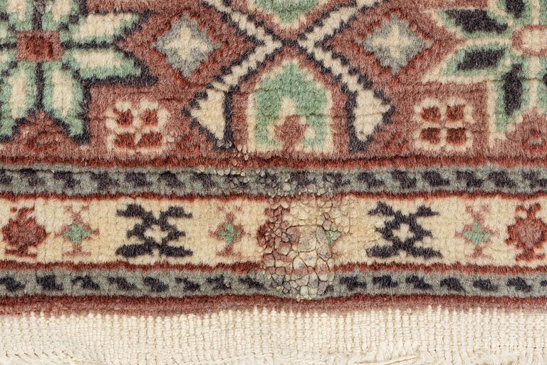 A carpet, semi antique/old, possibly Ardabil, c. 180 x 115 cm.