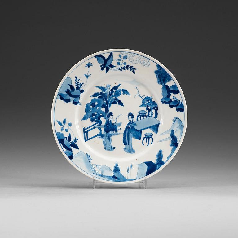 A set of four blue and white dinner plates, Qing dynasty, with Kangxi six character mark and period (1662-1722).