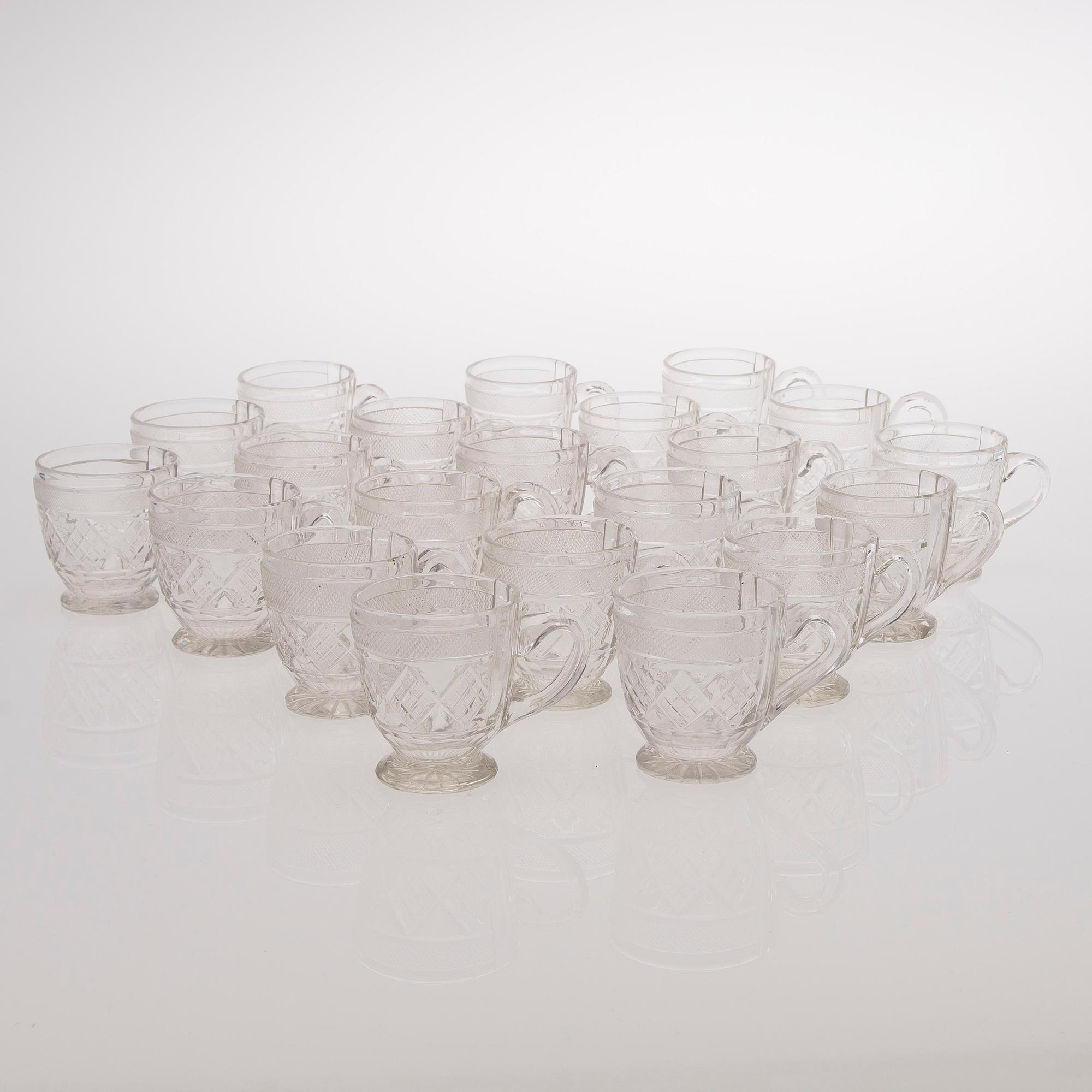 21 Russian glass punch mugs, the late 19th century.