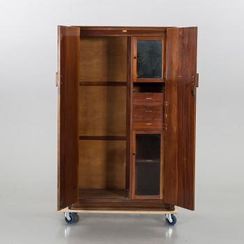 An English Lebus Furniture mens wardrobe around 1900.