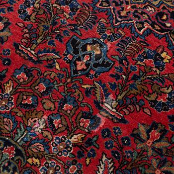 An American Sarouk rug, semi antique, c. 200 x 133 cm.