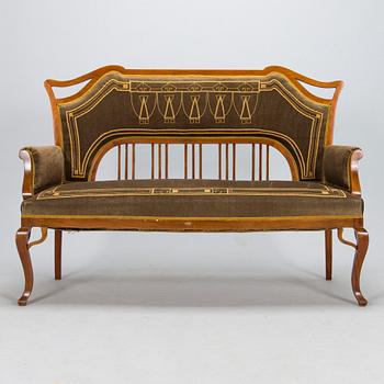 An eight piece Art Nouveau lounge suite in mahogany, Belgium/Netherlands, early 20th century.