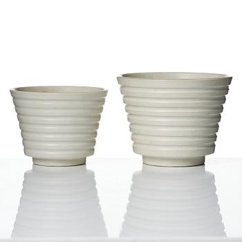 Wilhelm Kåge, A set of three ceramic flower pots, a vase and jar with lid,  Gustavsberg 1930s.