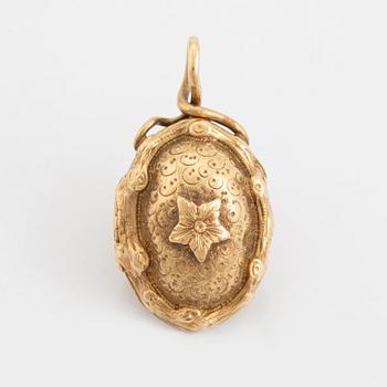 Cabochon cut ruby and rose cut diamond pendant.