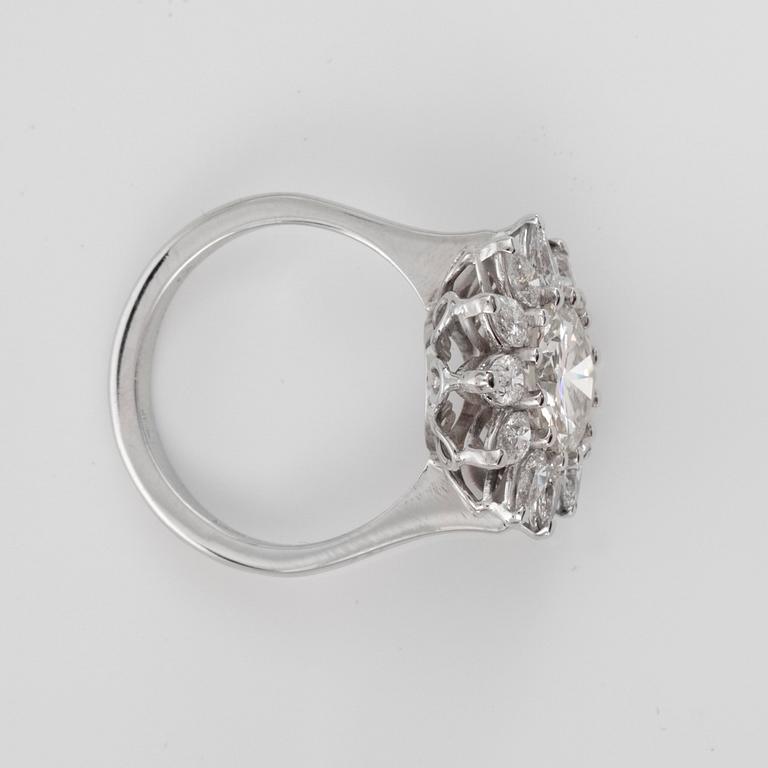 RING with a 2.27 ct center stone brilliant-cut diamond and pear-shaped diamond total carat weight 1.20 ct.