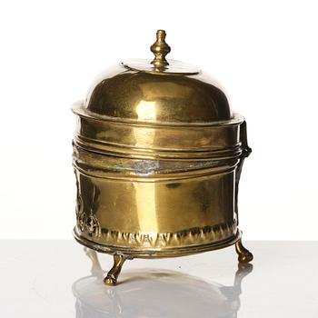 A baroque repousse brass pyxis, 18th century.