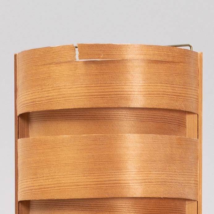 Hans-Agne Jakobsson, a pine and teak floor light from Ellysett.