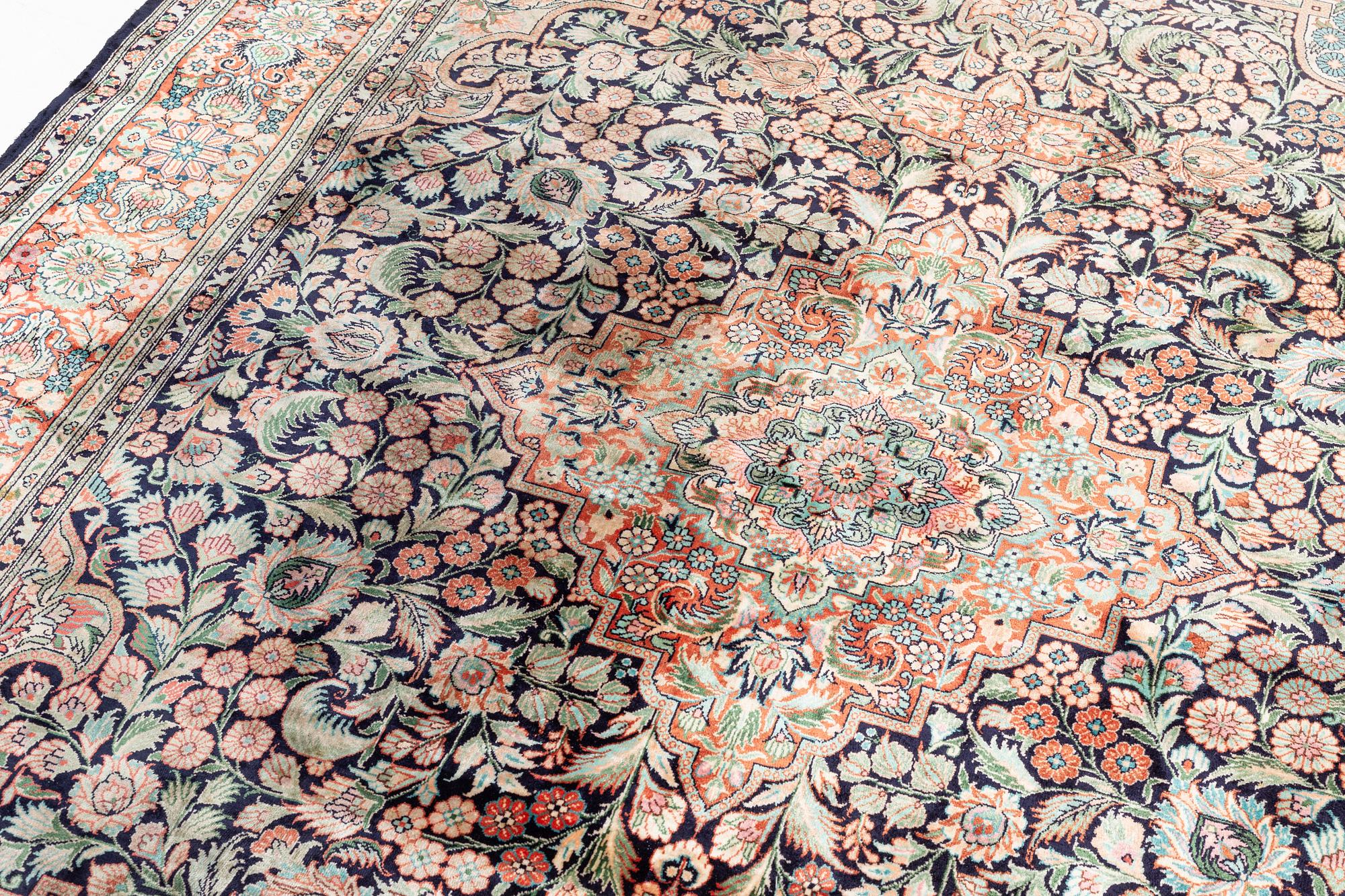 An oriental carpet, mercerized cotton, c. 275 x 182 cm.