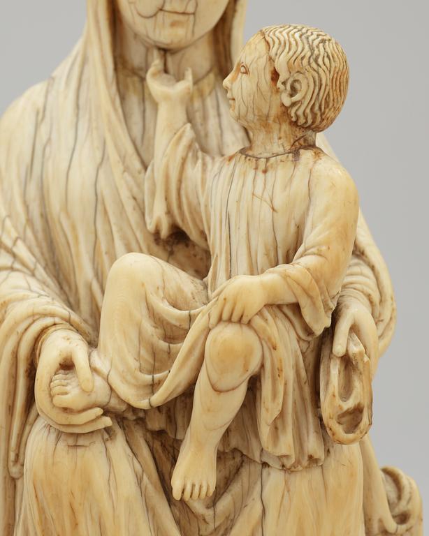 Virgin and Child, a French Gothic ivory statuette, second half of the 13th century.