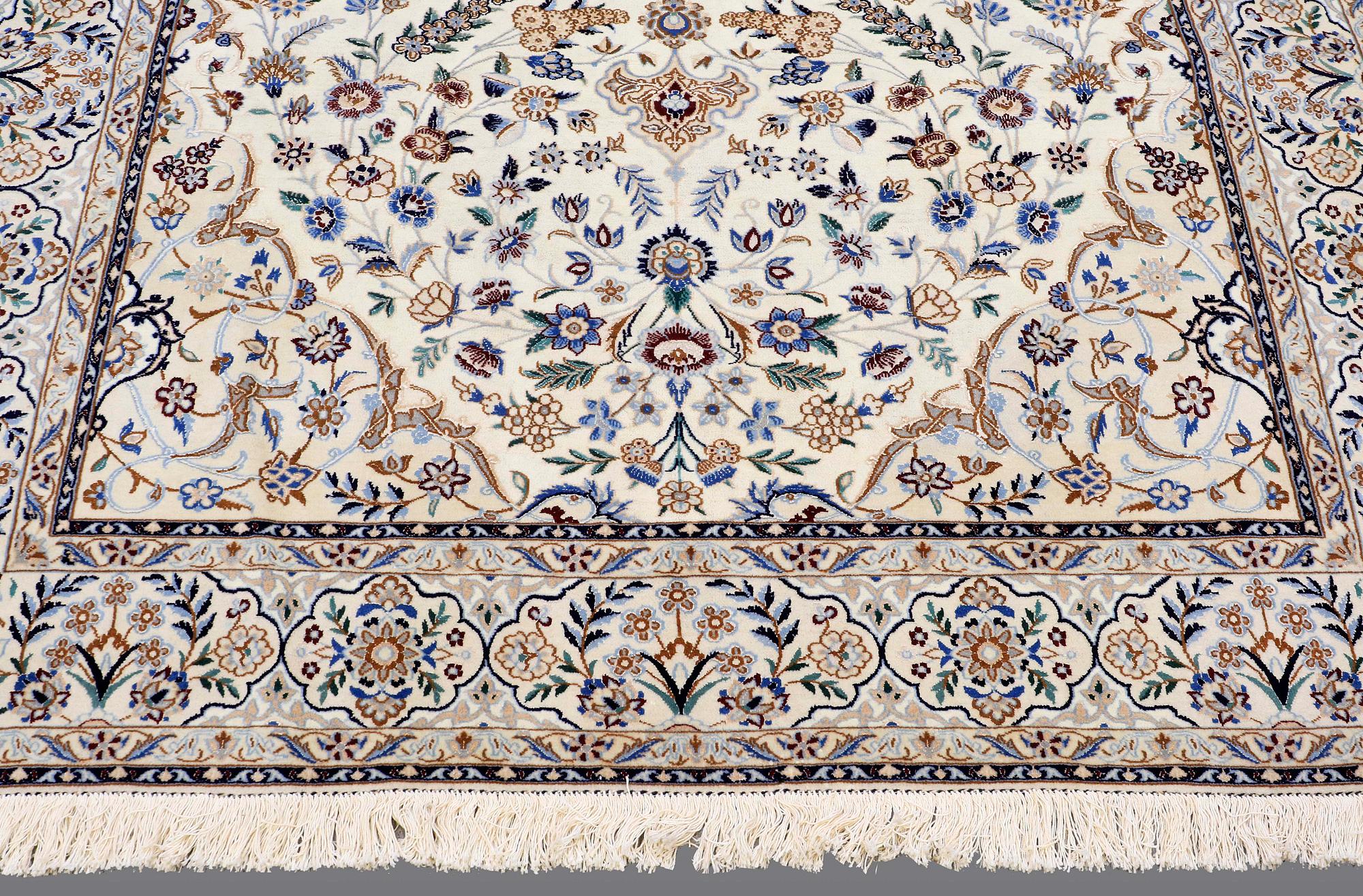 A CARPET, Nain part silk, so called 9 LAA, ca 307 x 210 cm.