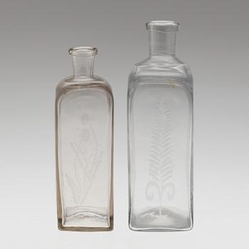 BRÄNNVINSFLASKOR, 2 st, glas, 1800-tal.