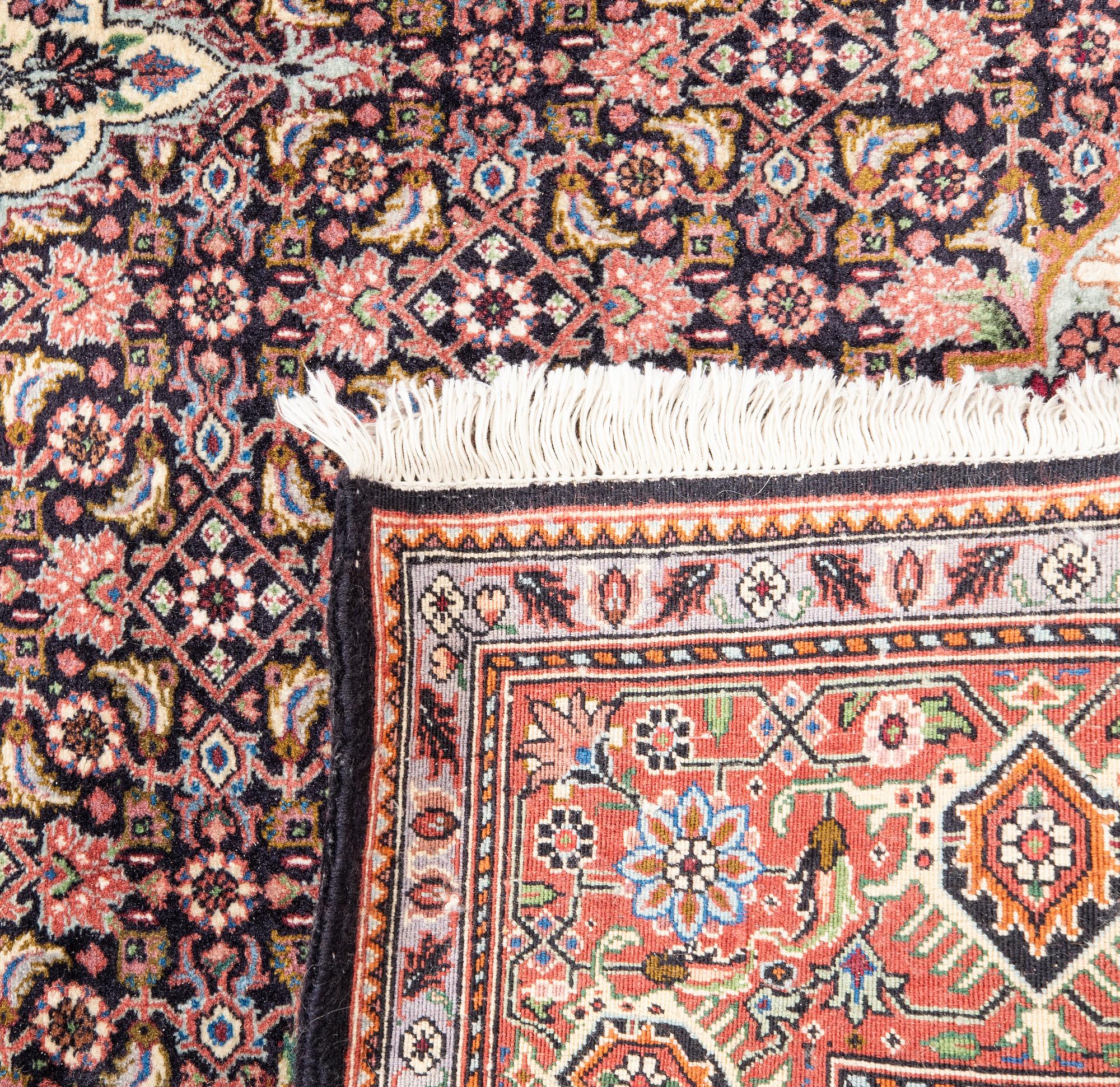 An old Bidjar carpet approx 210x138 cm.