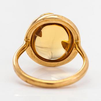 Tiffany & Co, Paloma Picasso, an 18K gold ring, with a cabochon-cut citrine.