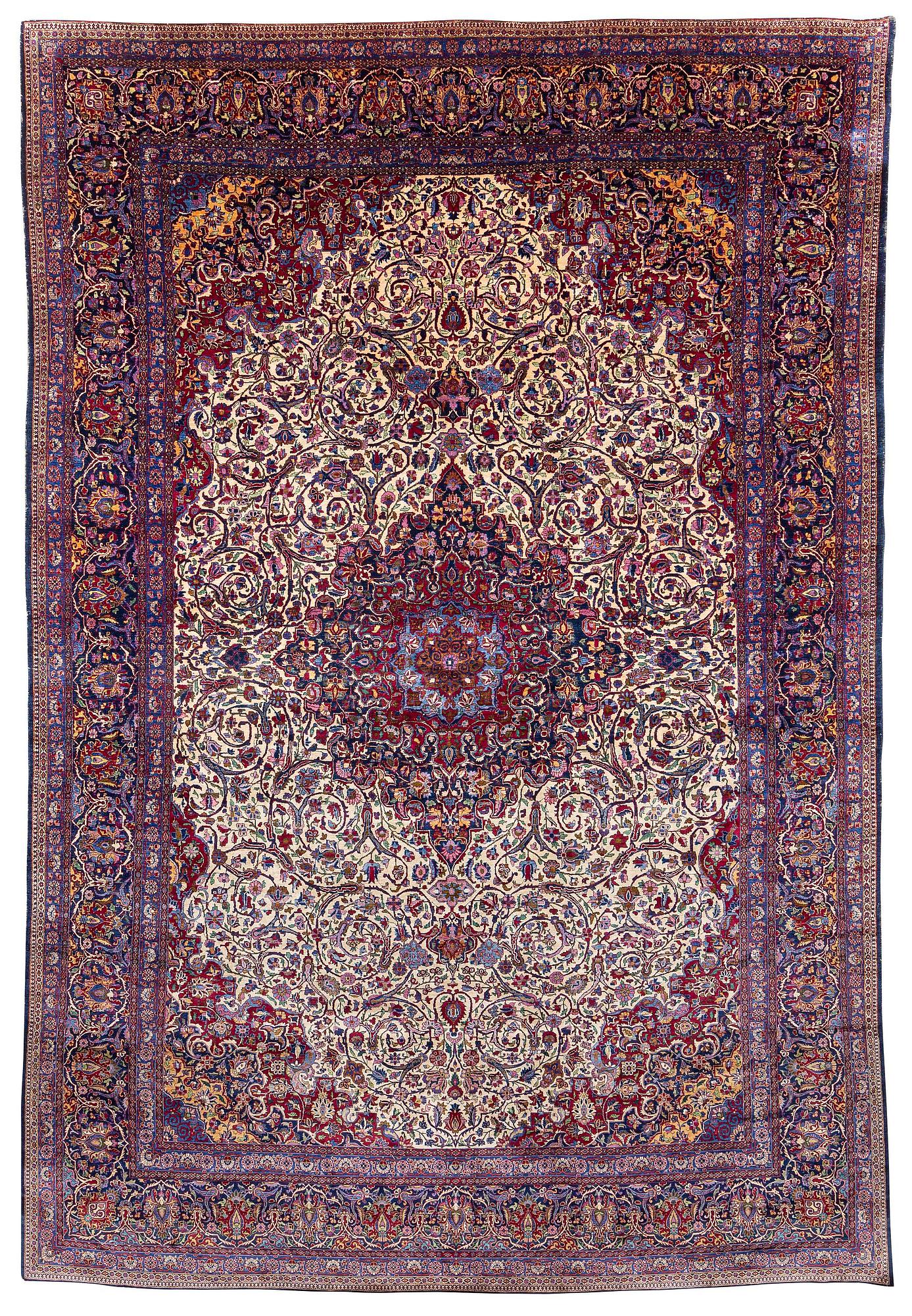 An antique silk Kashan carpet, central Persia (Iran) c. 378 x 259 cm.