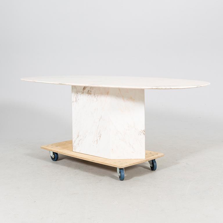 A late 1900s marble dining table.