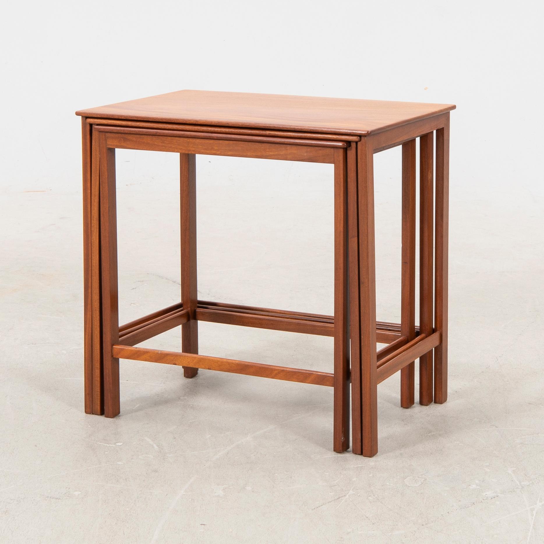 Jacob Kjaer, a mahogany nesting table later part of the 20th century.