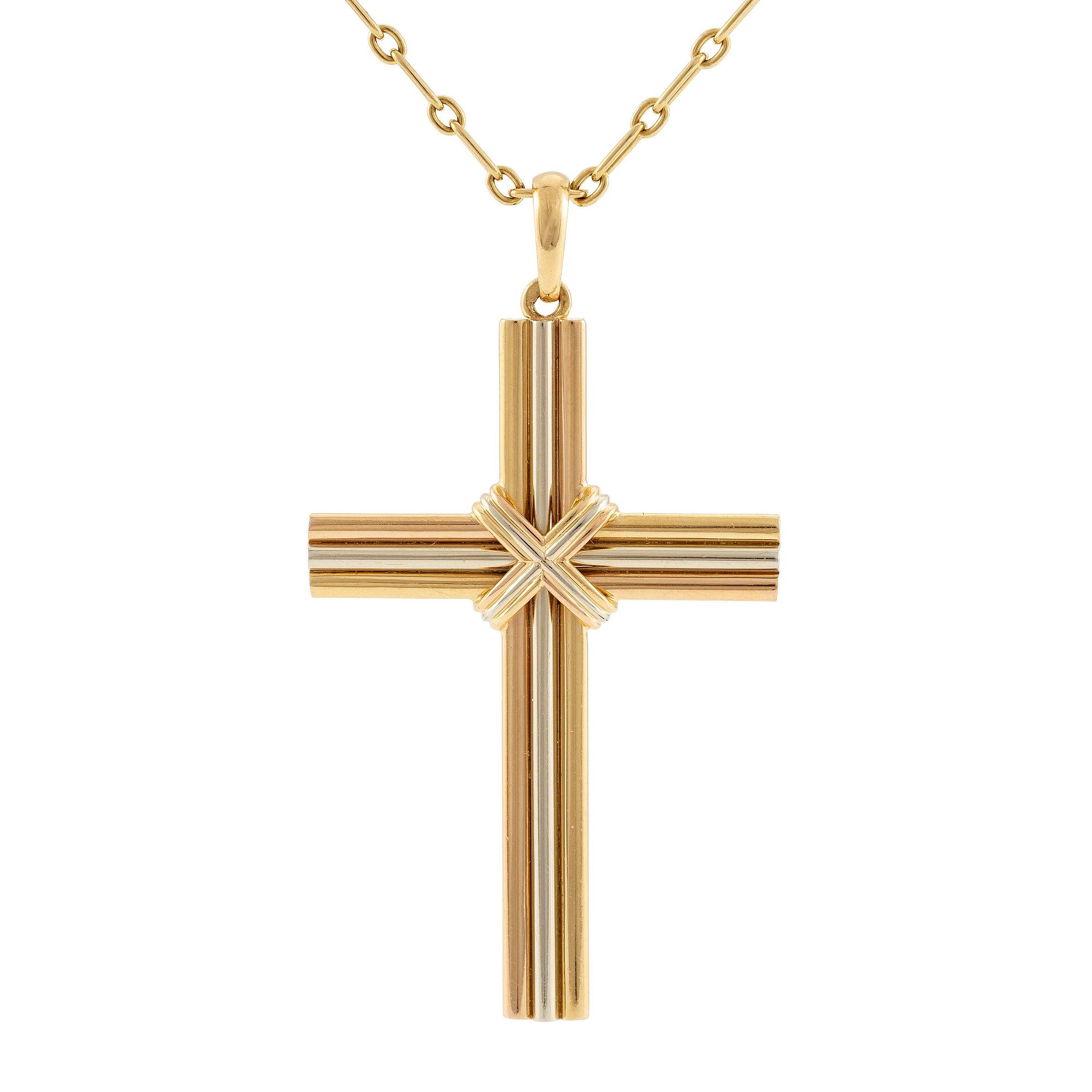 A Cartier necklace 18K multi-coloured gold "Trinity" cross.