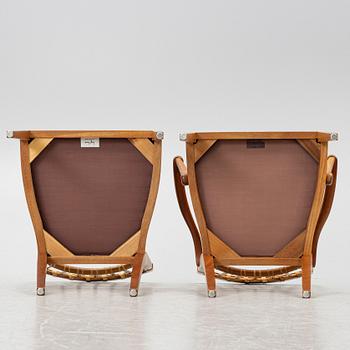 Josef Frank, a set of 8+2 dining chairs, model 1165, Svenskt Tenn, ca 1987.