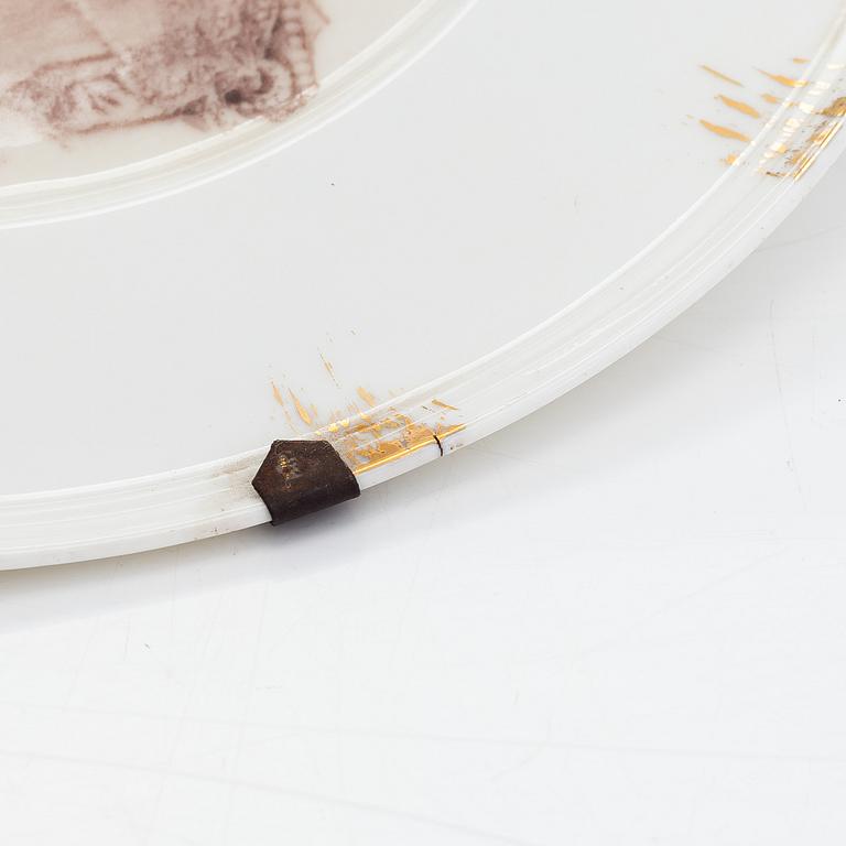 A pair of porcelain plates for Hache & Co, France.