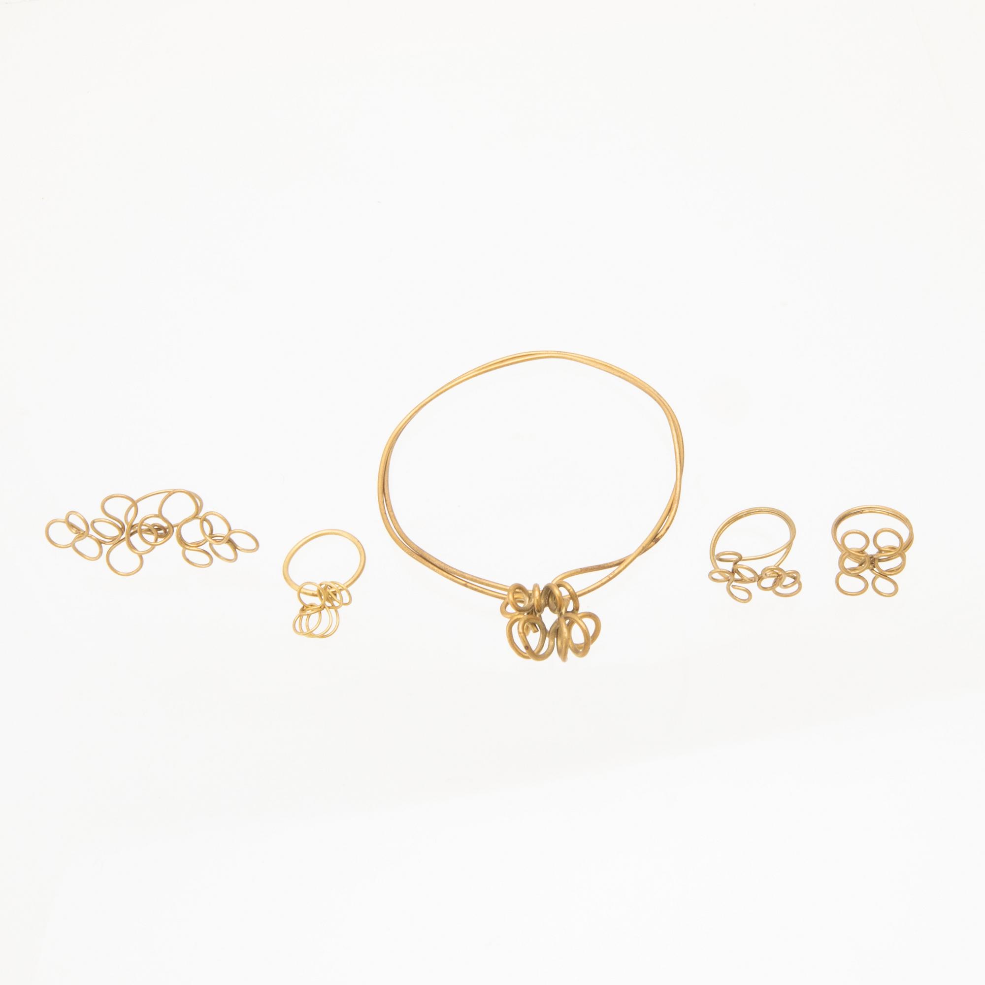 Berit Johansson, bangle and rings 4 pcs brass.