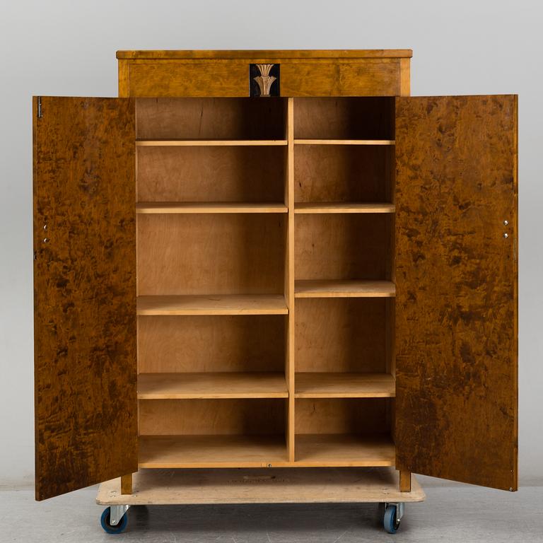 A birch venereed cabinet, 1930's.