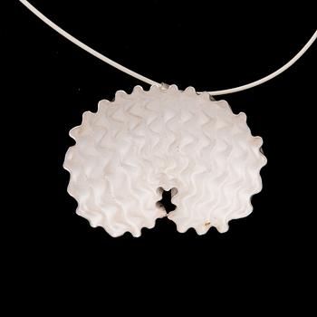 A NECKLACE, "Shelter", etched white silver, white rubber band, 2010.