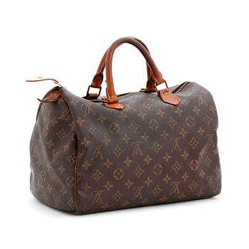 495. LOUIS VUITTON, a monogram canvas bag, "Speedy 30".
