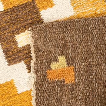 A flat weave carpet signed Erik Lundberg ca 240 x 170 cm.