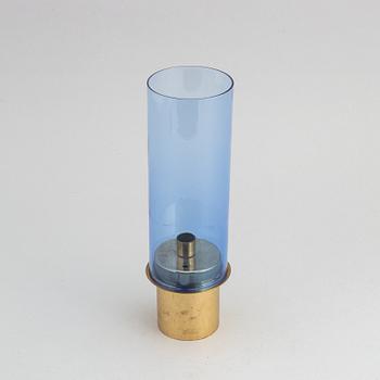 Hans-Agne Jakobsson, a brass and glass candle holder from Markaryd.
