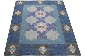 Ingegerd Silow, a flat weave carpet, signed IS, c. 227 x 164 cm.