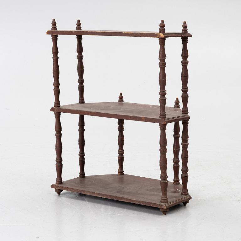 A wall shelf, 19th Century.