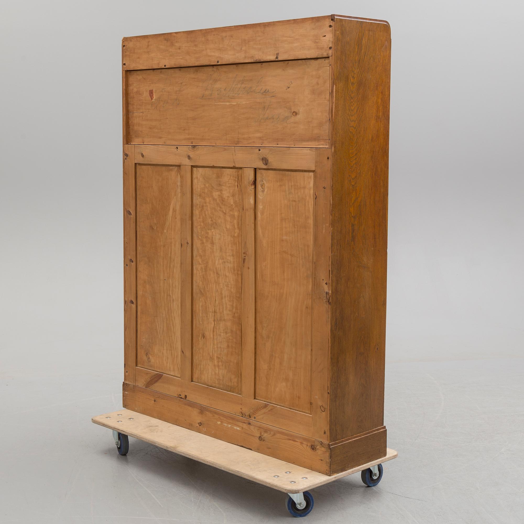 An early 20th century bookcase /  cabinet.