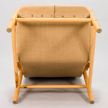 BROR BOIJE, A pair of 'Junker' easy chairs and an ottoman for Dux, Sweden, latter half of the 20th Century.