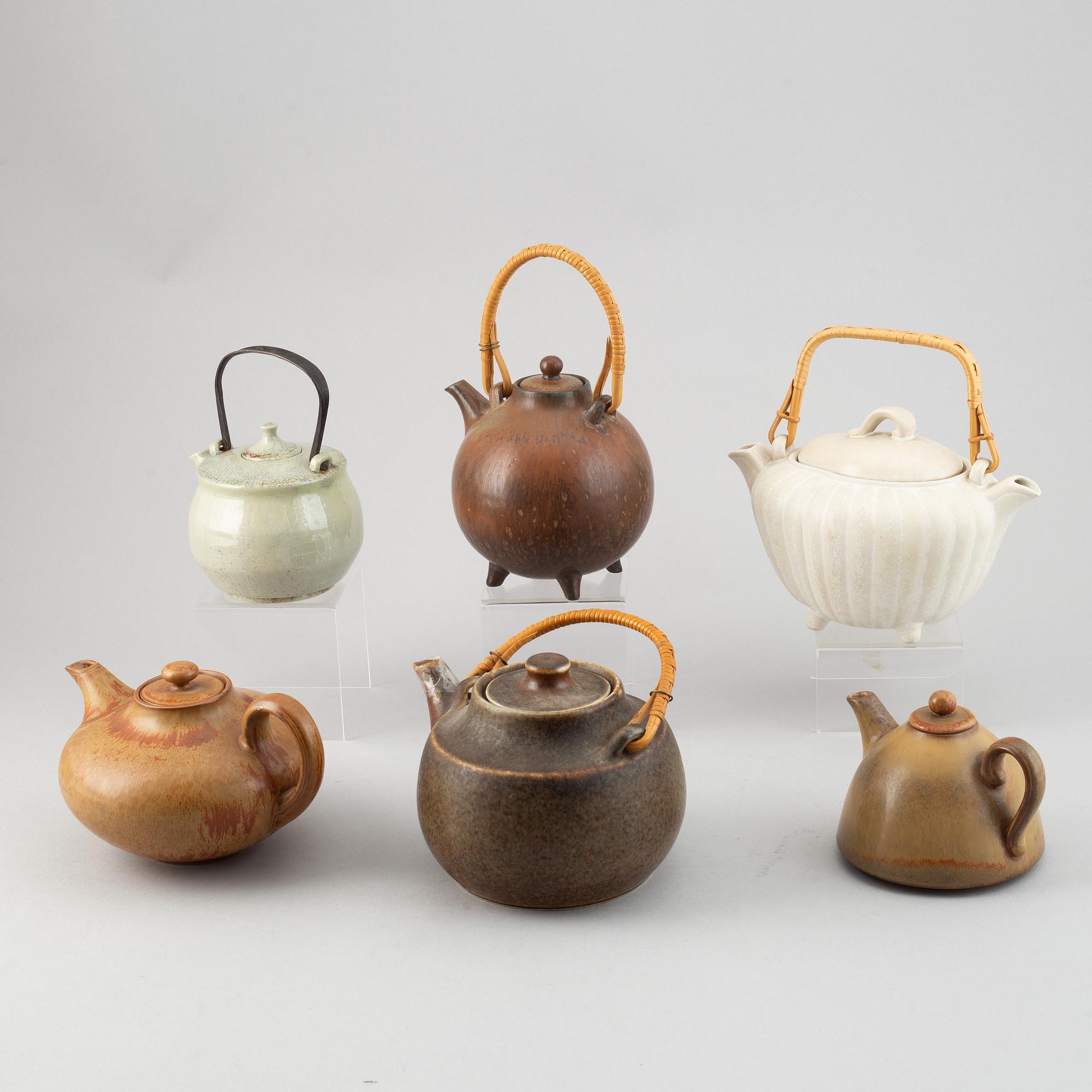 Gunnar Nylund, a set of four stoneware teapots and Carl-Harry Stålhane, two teapots, Rörstrand.